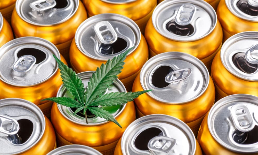 Gold delta 8 drinks cans with a cannabis leaf.